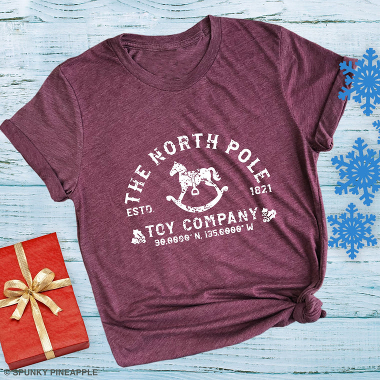 The North Pole Toy Company Premium Unisex T-Shirt